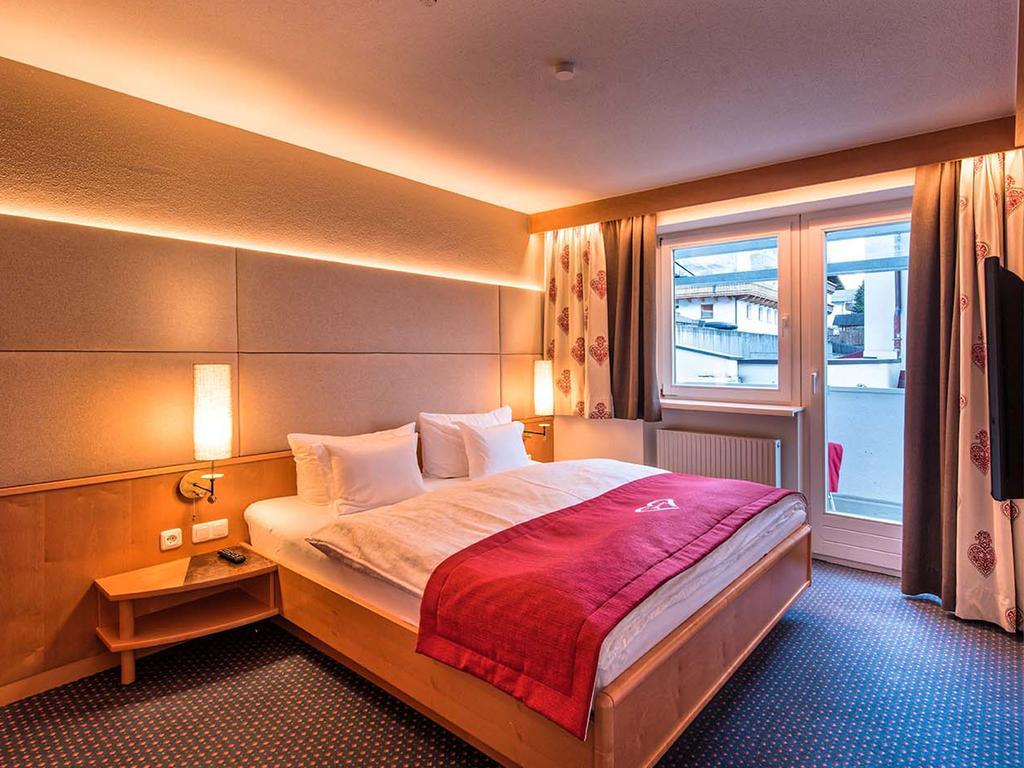 Hotel Universo Зерфаус Стая снимка